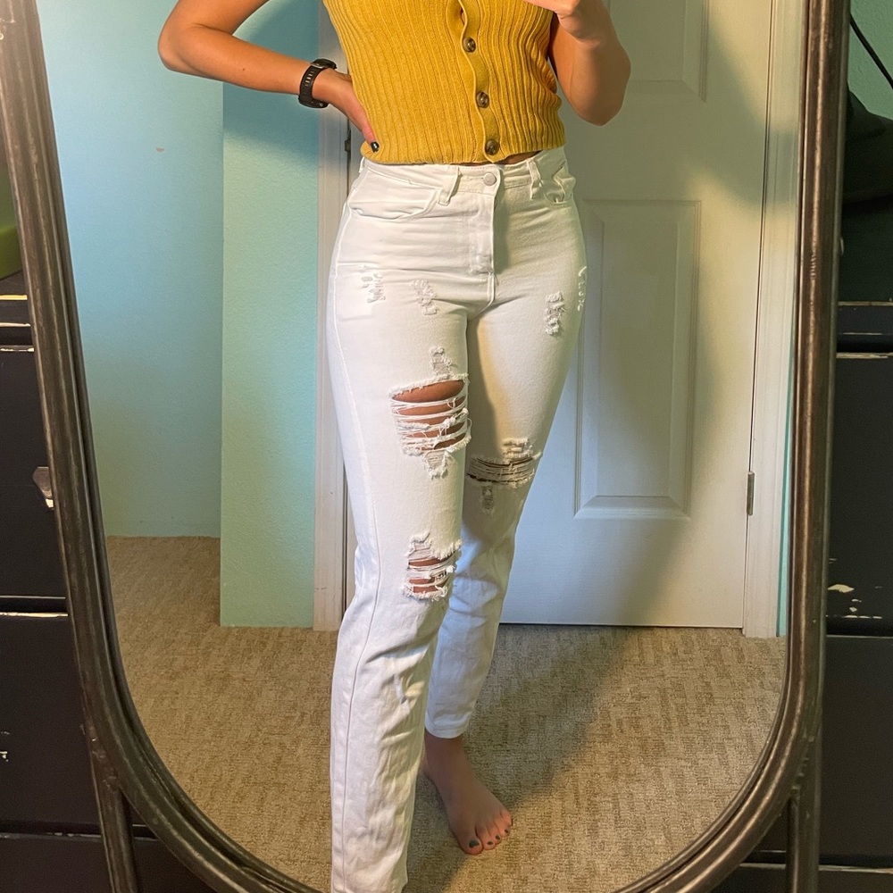 Size small (4) white ripped jeans.